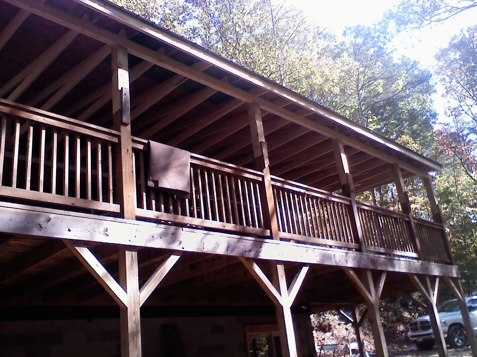 Timber framing under a new elevated porch and deck — Roof Leak Repair in Talmage by Roofing Brothers
